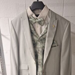 Stylish Light Green Men's Suit with Patterned Vest and Bow Tie